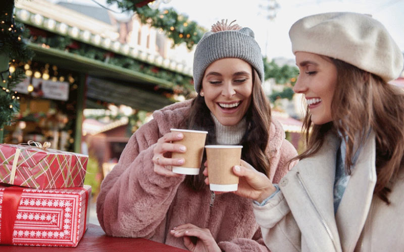 friends enjoying the Christmas Market, Manchester winter trip, November 2024, UK